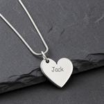 Silver heart-shaped pendant necklace with engraving