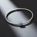 Silver bracelet with memorial ashes paw-shaped charm