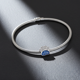 Silver bracelet with memorial ashes paw-shaped charm