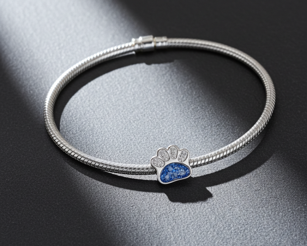 Silver bracelet with memorial ashes paw-shaped charm