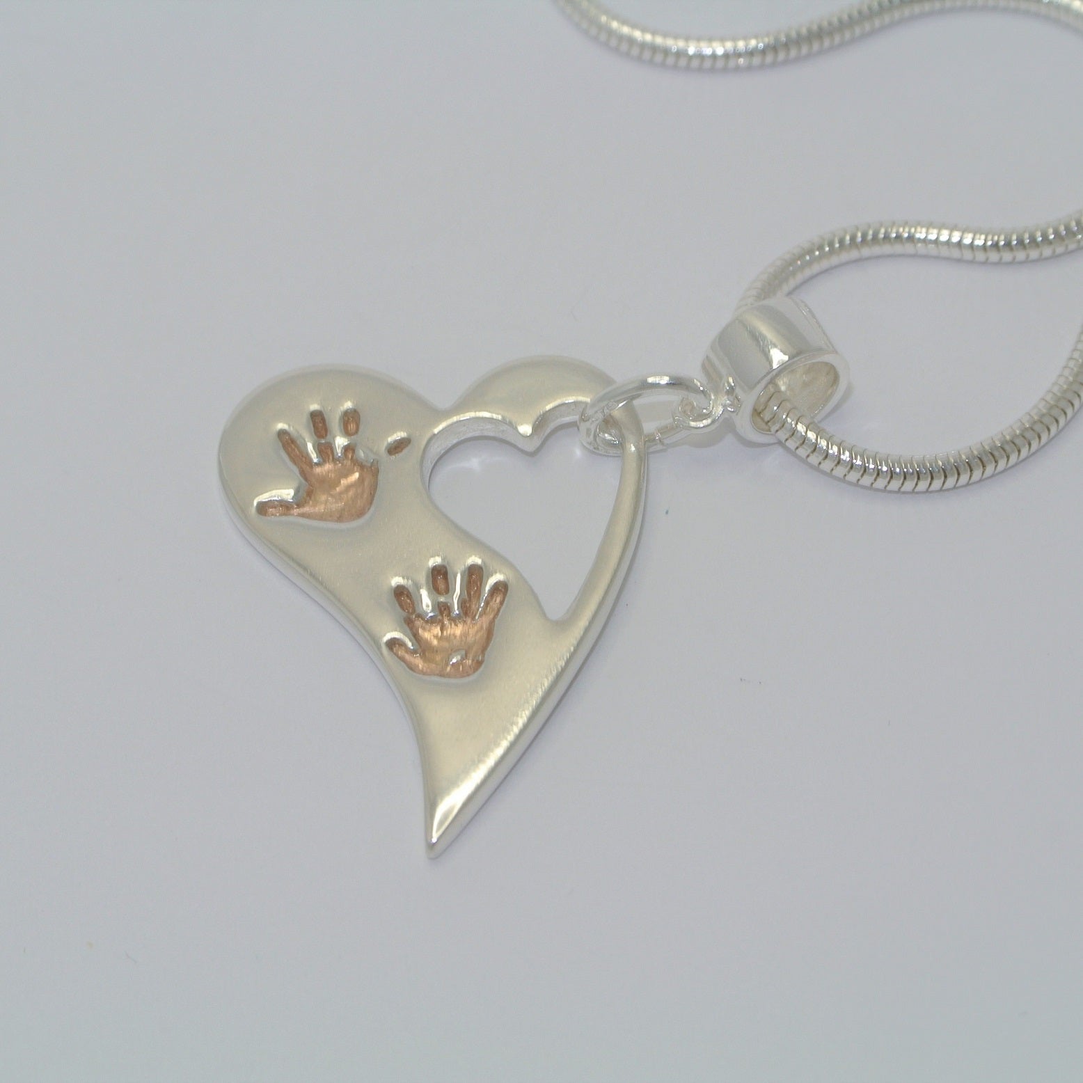 Wavy Heart Two Handprints with Rose Gold. Sterling Silver Handprint Jewellery