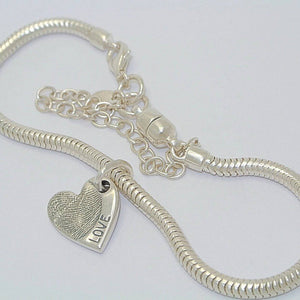 baby fingerprint jewellery, baby fingerprint necklace, child fingerprint necklace, hand print jewellery, childrens fingerprint jewellery, personalised fingerprint jewellery, personalised fingerprint bracelet, personalised handprint jewellery, silver handprint jewellery, handprint necklace uk, from the heart jewellery, baby print jewellery, personalised silver jewellery, fingerprint jewellery bracelet