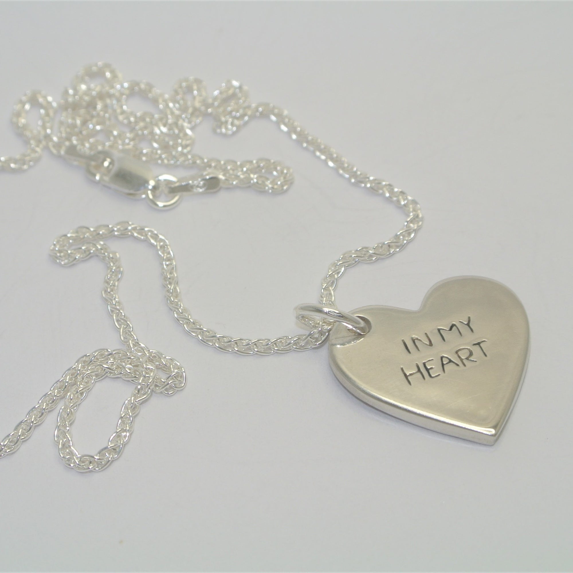 Love on sale imprint jewellery
