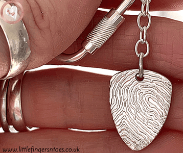 silver keyring with fingerprint