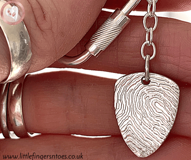 silver keyring with fingerprint