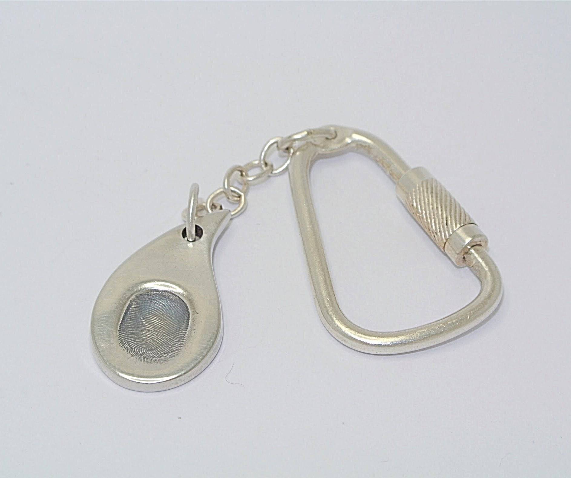 silver keyring with fingerprint