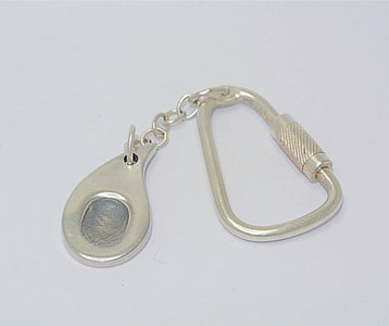 silver keyring with fingerprint